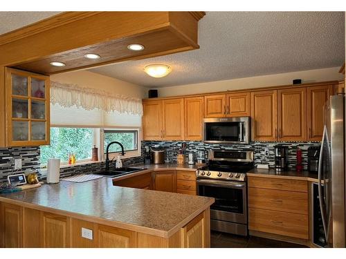 10603 99 Street, Peace River, AB - Indoor Photo Showing Kitchen With Double Sink