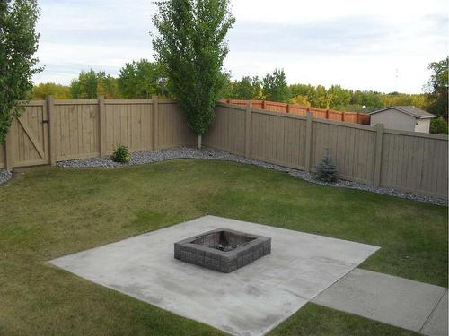 505 4Th Street Ne, Manning, AB - Outdoor With Backyard