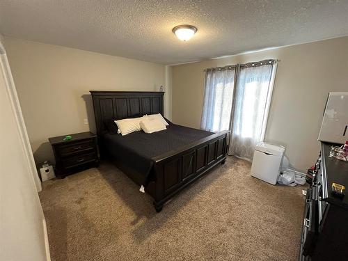 4417 52A Street, Grimshaw, AB - Indoor Photo Showing Bedroom