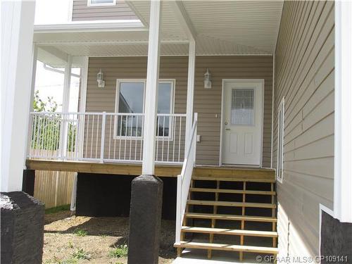 4417 52A Street, Grimshaw, AB - Outdoor With Deck Patio Veranda With Exterior