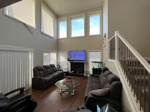 4417 52A Street, Grimshaw, AB - Indoor Photo Showing Living Room With Fireplace