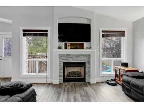 6502 O'Brien Lake Drive Se, Grande Prairie, AB - Indoor Photo Showing Living Room With Fireplace