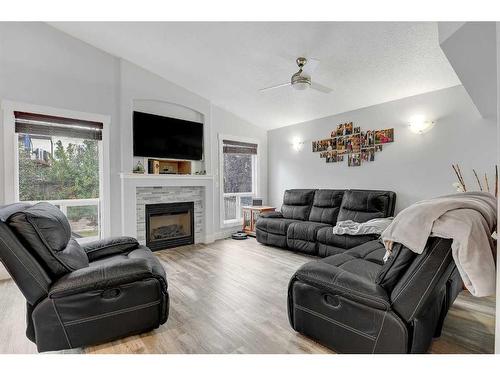 6502 O'Brien Lake Drive Se, Grande Prairie, AB - Indoor Photo Showing Living Room With Fireplace