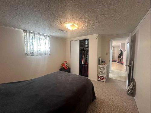 4913 53 Avenue, Grimshaw, AB - Indoor Photo Showing Bedroom