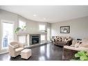 8958 95 Avenue, Grande Prairie, AB  - Indoor Photo Showing Living Room With Fireplace 