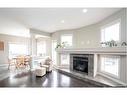 8958 95 Avenue, Grande Prairie, AB  - Indoor Photo Showing Living Room With Fireplace 