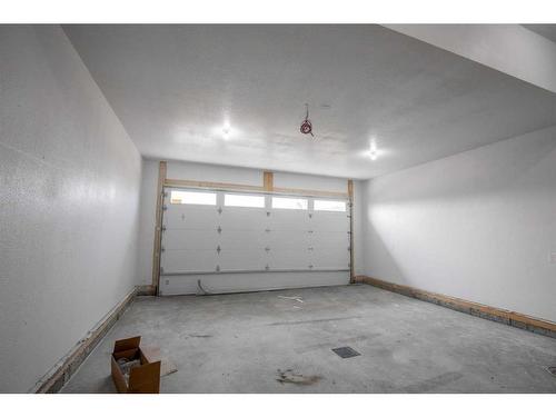 705-11850 84 Avenue, Grande Prairie, AB - Indoor Photo Showing Garage