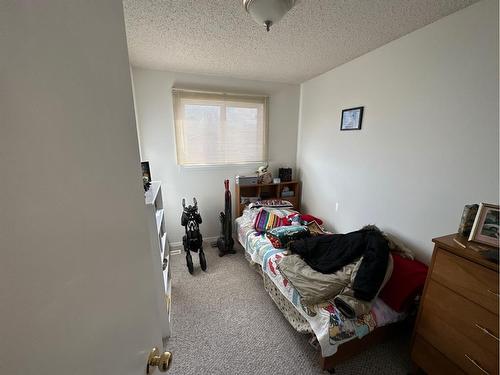 4702 54 Avenue, Grimshaw, AB - Indoor Photo Showing Bedroom