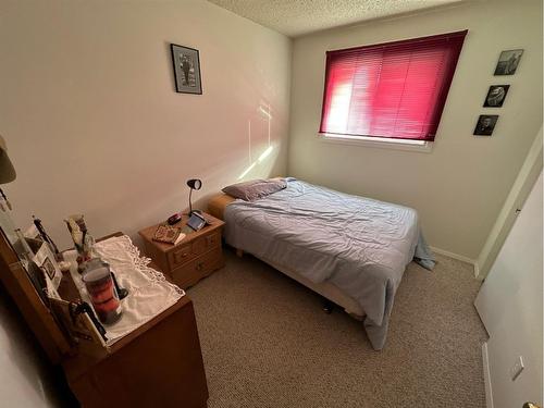 4702 54 Avenue, Grimshaw, AB - Indoor Photo Showing Bedroom