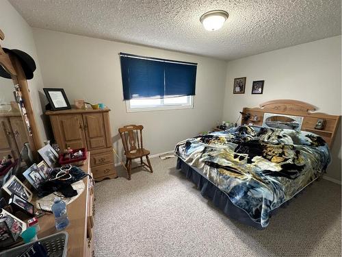 4702 54 Avenue, Grimshaw, AB - Indoor Photo Showing Bedroom