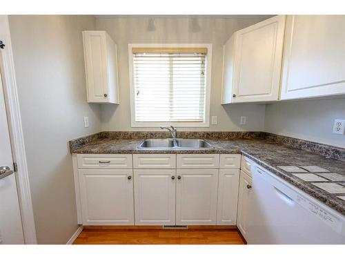 10325 Kateri Drive, Grande Prairie, AB - Indoor Photo Showing Kitchen With Double Sink