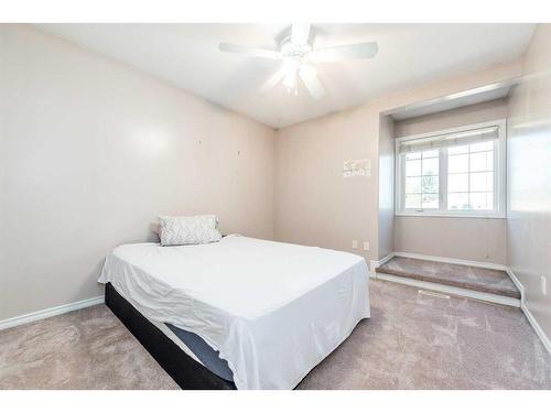 9009 117 Avenue, Grande Prairie, AB - Indoor Photo Showing Bedroom