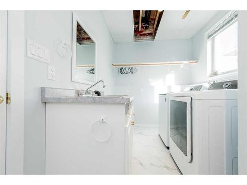 9009 117 Avenue, Grande Prairie, AB - Indoor Photo Showing Laundry Room