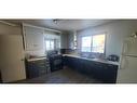 10106 110 Avenue, Grande Prairie, AB  - Indoor Photo Showing Kitchen With Double Sink 