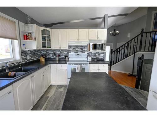 8837 106 Avenue, Grande Prairie, AB - Indoor Photo Showing Kitchen With Double Sink