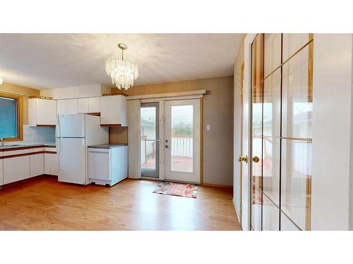 10603 92C Street, Grande Prairie, AB - Indoor Photo Showing Kitchen With Double Sink