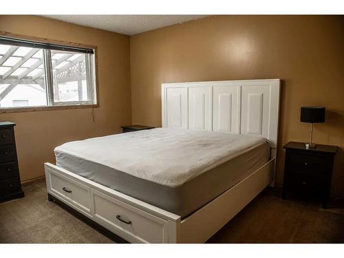 10513 106 Street, High Level, AB - Indoor Photo Showing Bedroom