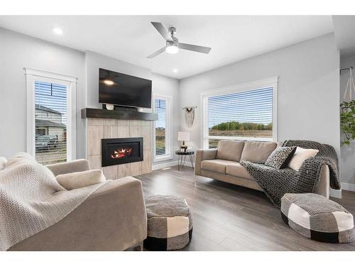 8017 90C Street, Grande Prairie, AB - Indoor Photo Showing Living Room With Fireplace