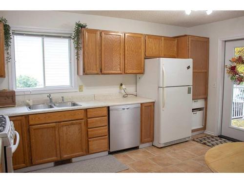 10128 93 Avenue, Grande Prairie, AB - Indoor Photo Showing Kitchen With Double Sink