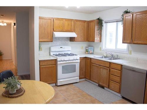 10128 93 Avenue, Grande Prairie, AB - Indoor Photo Showing Kitchen With Double Sink