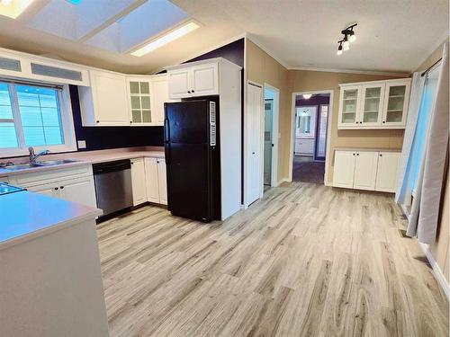 4713 42 Avenue, Spirit River, AB - Indoor Photo Showing Kitchen With Double Sink