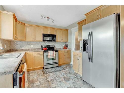 8603 103 Avenue, Grande Prairie, AB - Indoor Photo Showing Kitchen With Stainless Steel Kitchen With Double Sink