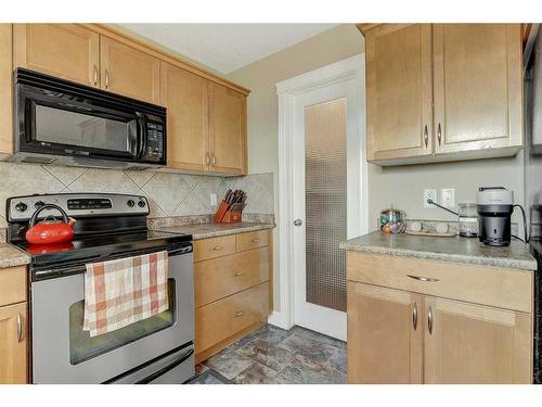 8603 103 Avenue, Grande Prairie, AB - Indoor Photo Showing Kitchen