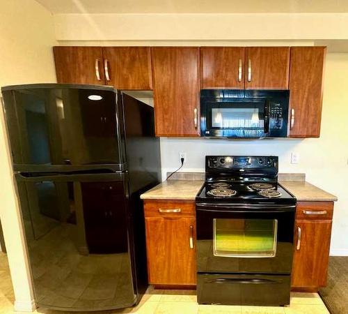 111-9120 96 Avenue, Grande Prairie, AB - Indoor Photo Showing Kitchen