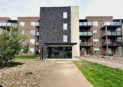 304-9120 96 Avenue, Grande Prairie, AB - Outdoor With Balcony With Facade