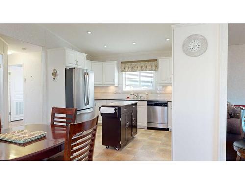 11205 97 Street, Clairmont, AB - Indoor Photo Showing Kitchen With Stainless Steel Kitchen