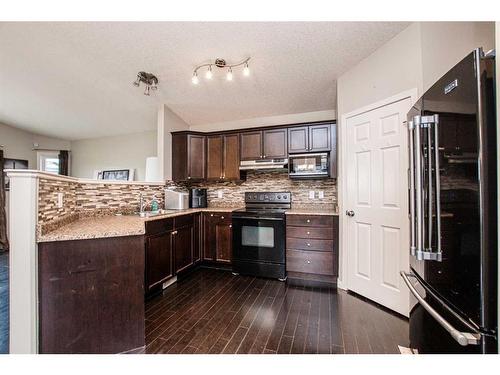 8844 75 Avenue, Grande Prairie, AB - Indoor Photo Showing Kitchen