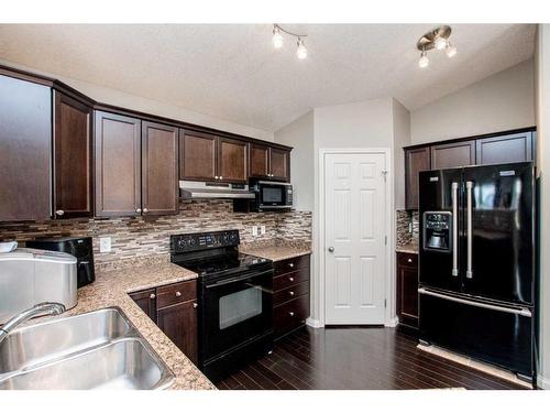 8844 75 Avenue, Grande Prairie, AB - Indoor Photo Showing Kitchen With Double Sink