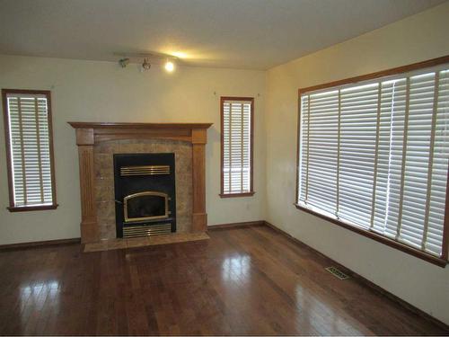 4411 51 Avenue, Valleyview, AB - Indoor Photo Showing Living Room With Fireplace