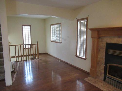 4411 51 Avenue, Valleyview, AB - Indoor Photo Showing Other Room With Fireplace