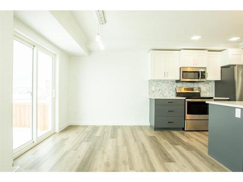 8845 85A Avenue, Grande Prairie, AB - Indoor Photo Showing Kitchen