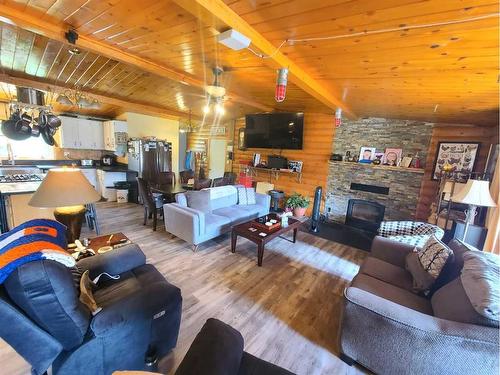 863036 Range Road 242, Rural Northern Lights, County Of, AB - Indoor Photo Showing Living Room With Fireplace