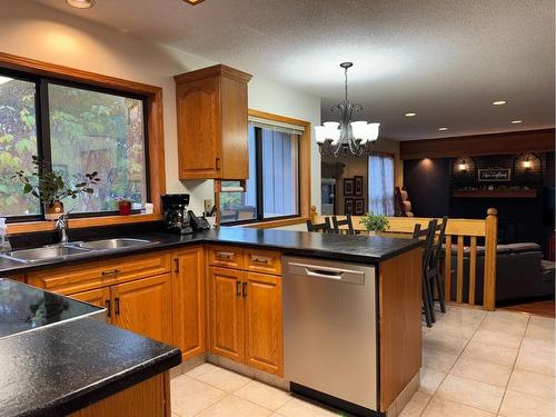 7213 96 Street, Peace River, AB - Indoor Photo Showing Kitchen With Double Sink