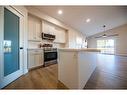 63 Pinnacle Lake Drive, Grande Prairie, AB  - Indoor Photo Showing Kitchen With Double Sink 