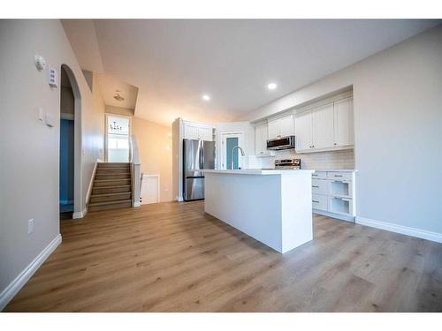 63 Pinnacle Lake Drive, Grande Prairie, AB - Indoor Photo Showing Kitchen With Double Sink With Upgraded Kitchen