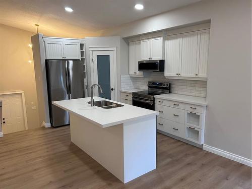 63 Pinnacle Lake Drive, Grande Prairie, AB - Indoor Photo Showing Kitchen With Double Sink