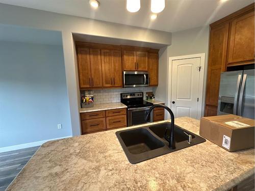 11321 & 11323 91 Street, Peace River, AB - Indoor Photo Showing Kitchen With Double Sink