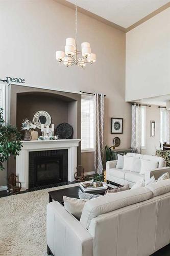 9305 Lakeshore Court, Grande Prairie, AB - Indoor Photo Showing Living Room With Fireplace