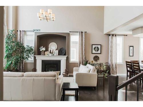 9305 Lakeshore Court, Grande Prairie, AB - Indoor Photo Showing Living Room With Fireplace