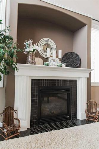 9305 Lakeshore Court, Grande Prairie, AB - Indoor Photo Showing Living Room With Fireplace