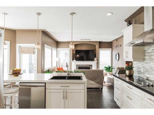 9305 Lakeshore Court, Grande Prairie, AB - Indoor Photo Showing Kitchen With Fireplace With Upgraded Kitchen