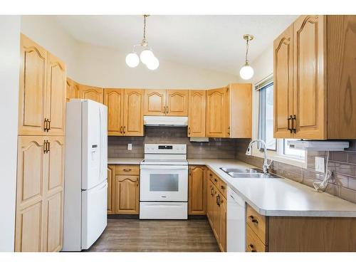 9309 61 Avenue, Grande Prairie, AB - Indoor Photo Showing Kitchen With Double Sink