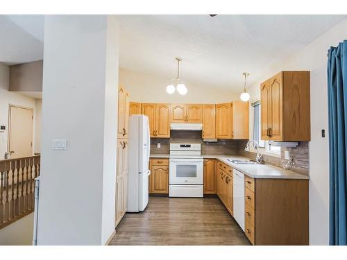 9309 61 Avenue, Grande Prairie, AB - Indoor Photo Showing Kitchen With Double Sink