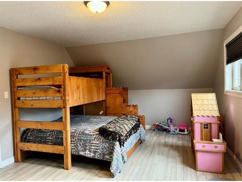 125 Monias Drive, Rural Big Lakes County, AB - Indoor Photo Showing Bedroom