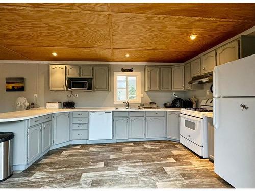 125 Monias Drive, Rural Big Lakes County, AB - Indoor Photo Showing Kitchen With Double Sink