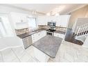 9326 Wedgewood Drive, Wedgewood, AB  - Indoor Photo Showing Kitchen With Stainless Steel Kitchen With Double Sink 